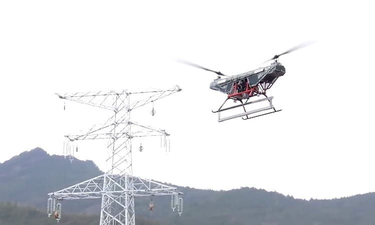 Drone hạng nặng chở vật liệu xây dựng lên độ cao 3.000 m